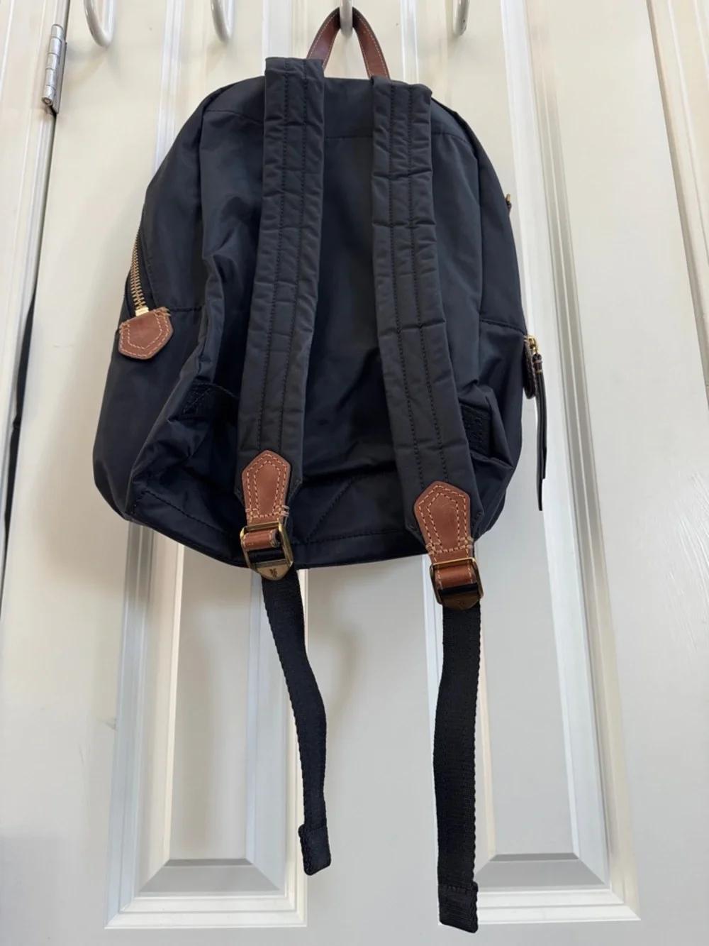 Frye Black Backpack with Brown Leather Accents and Gold Hardware